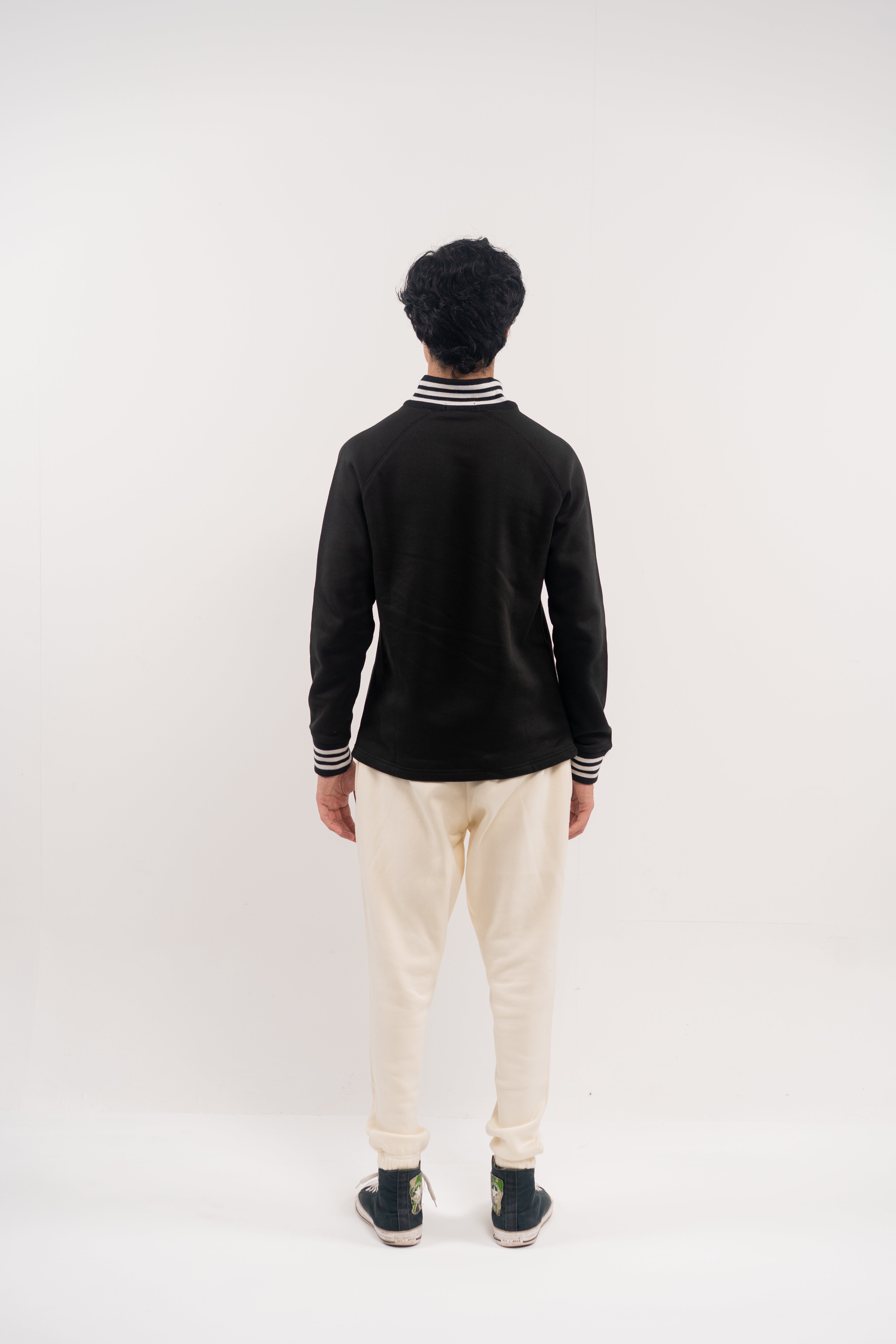 Classic Black Half-Zip Pullover with Striped Collar and Cuffs