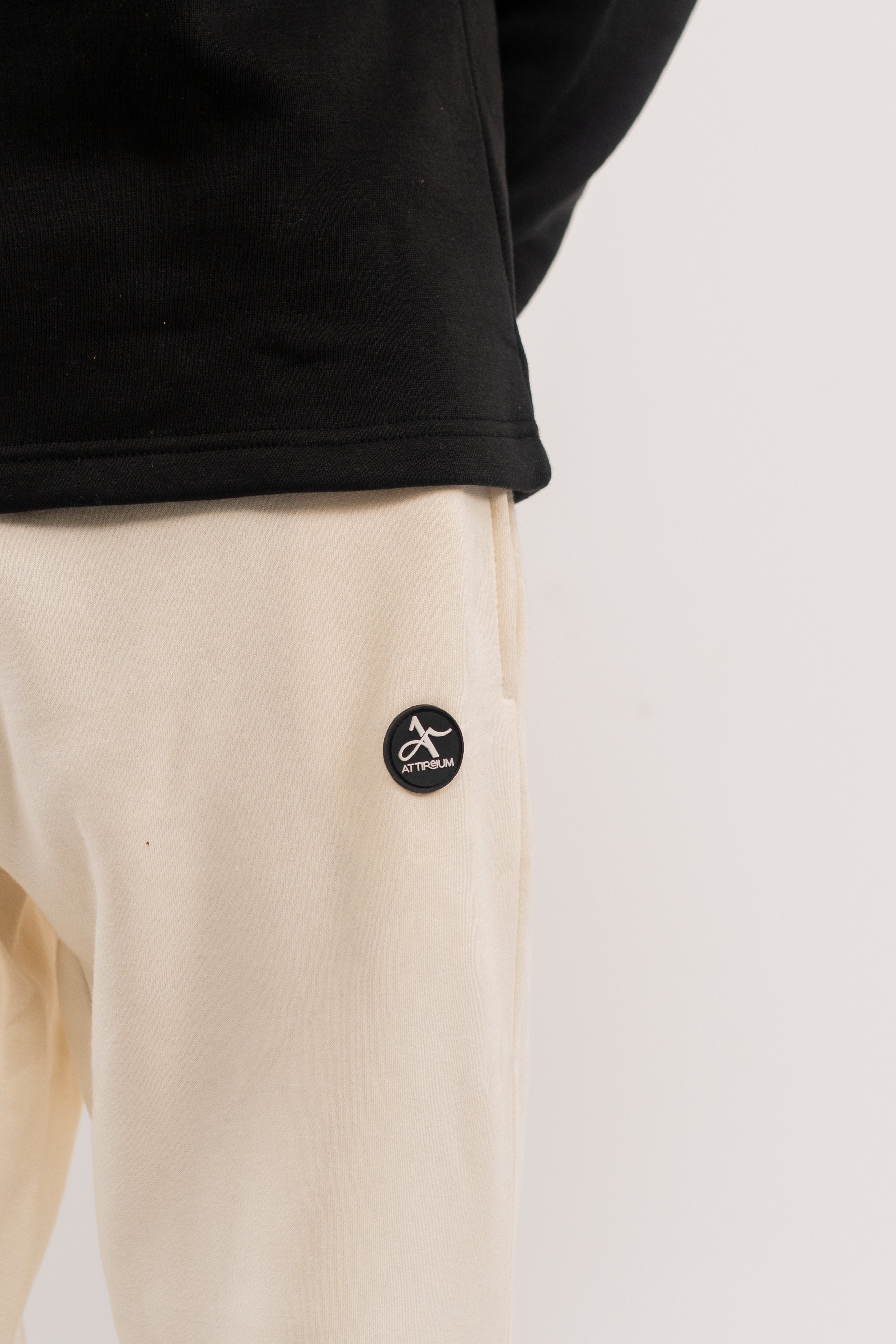 Classic Black Half-Zip Pullover with Striped Collar and Cuffs