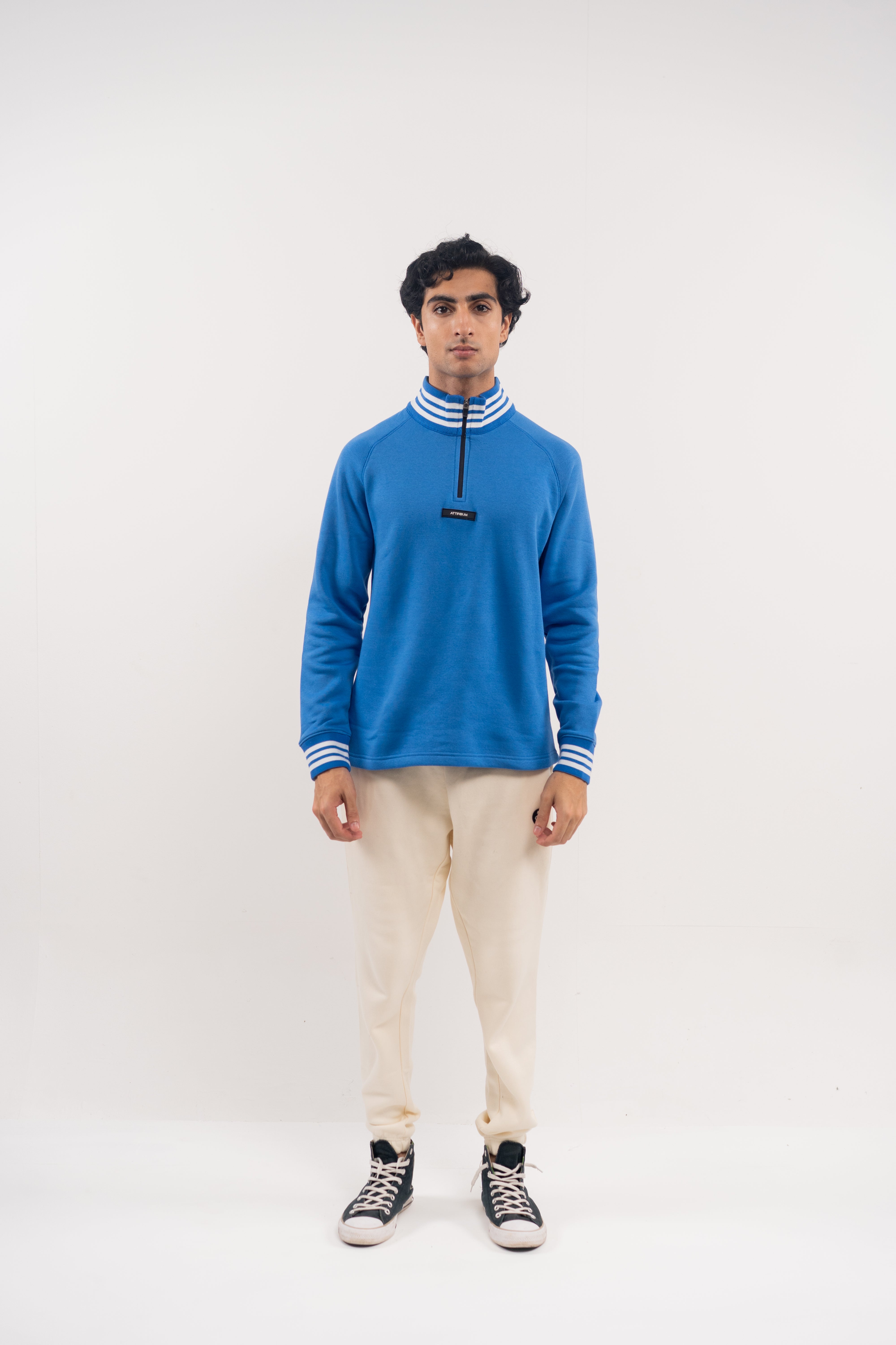 Bold Blue Half-Zip Pullover with Striped Accents