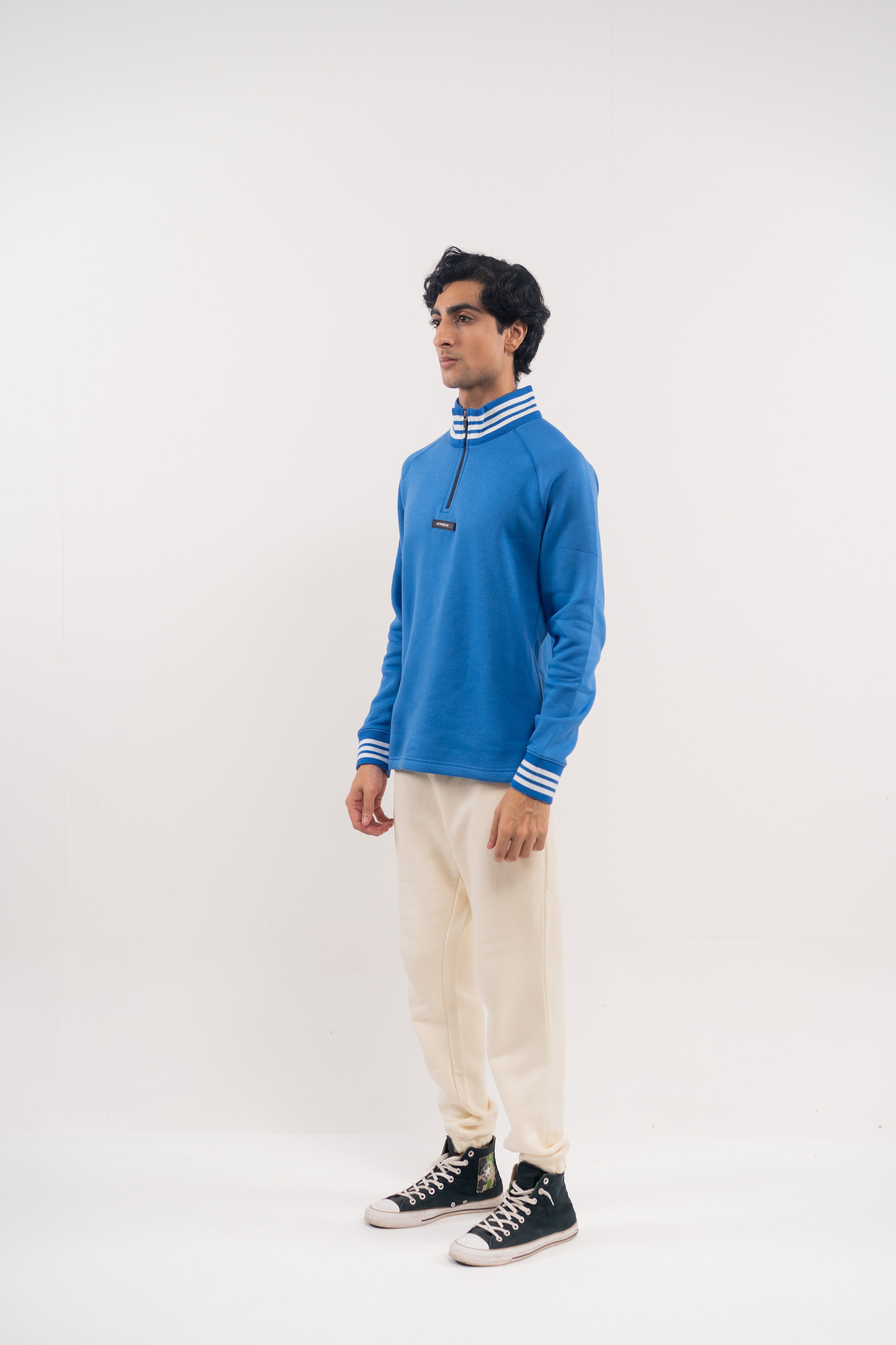 Bold Blue Half-Zip Pullover with Striped Accents