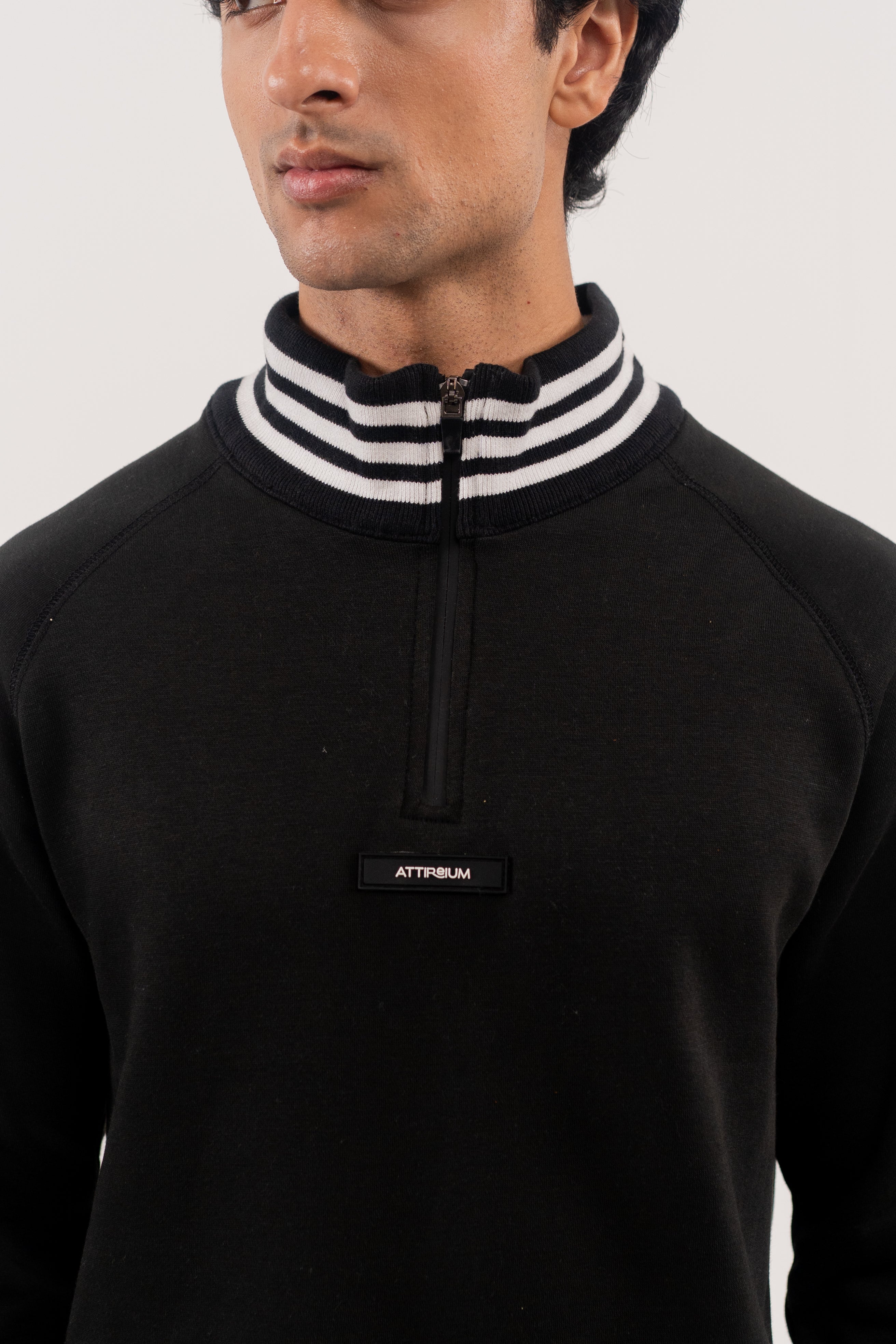 Classic Black Half-Zip Pullover with Striped Collar and Cuffs