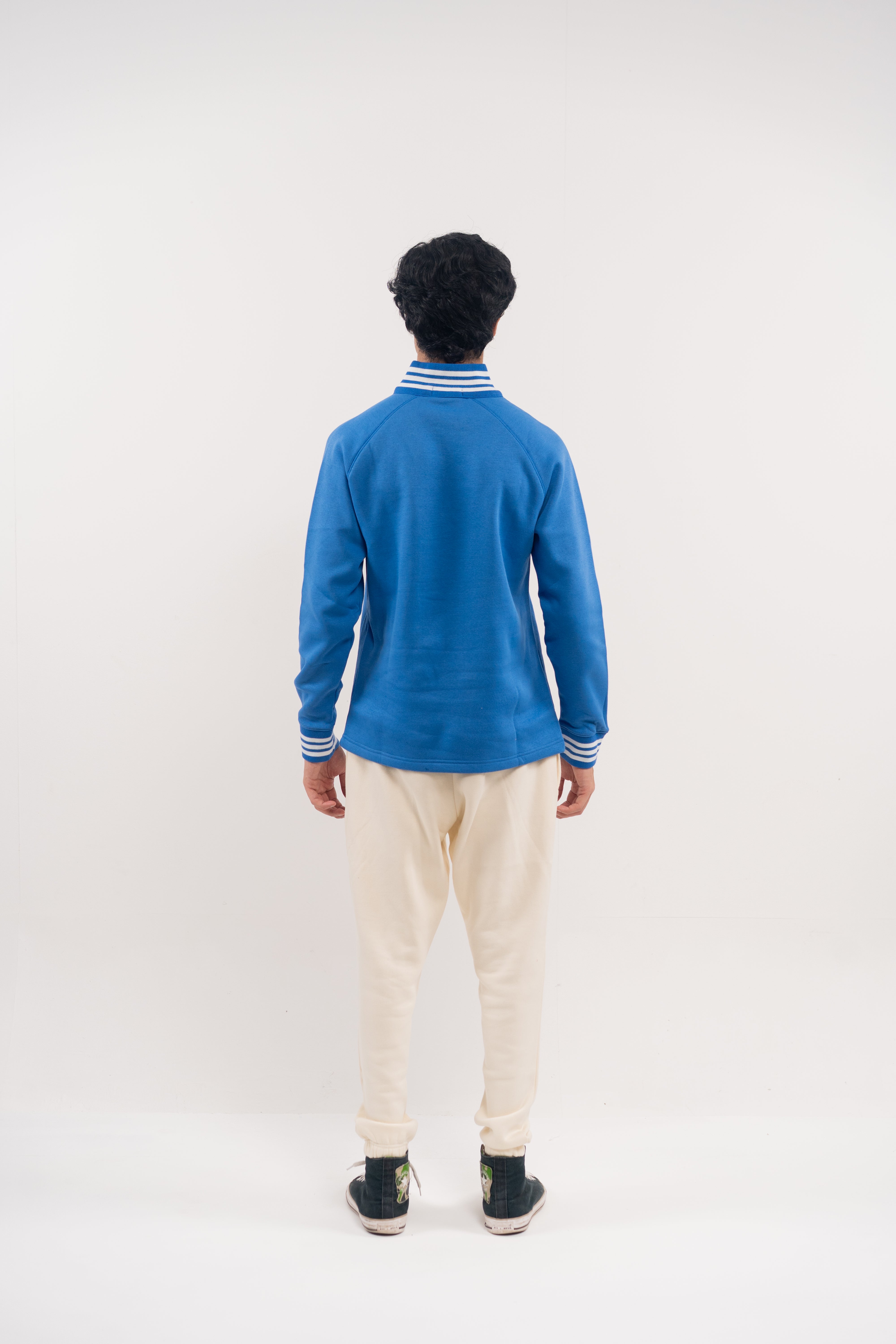 Bold Blue Half-Zip Pullover with Striped Accents